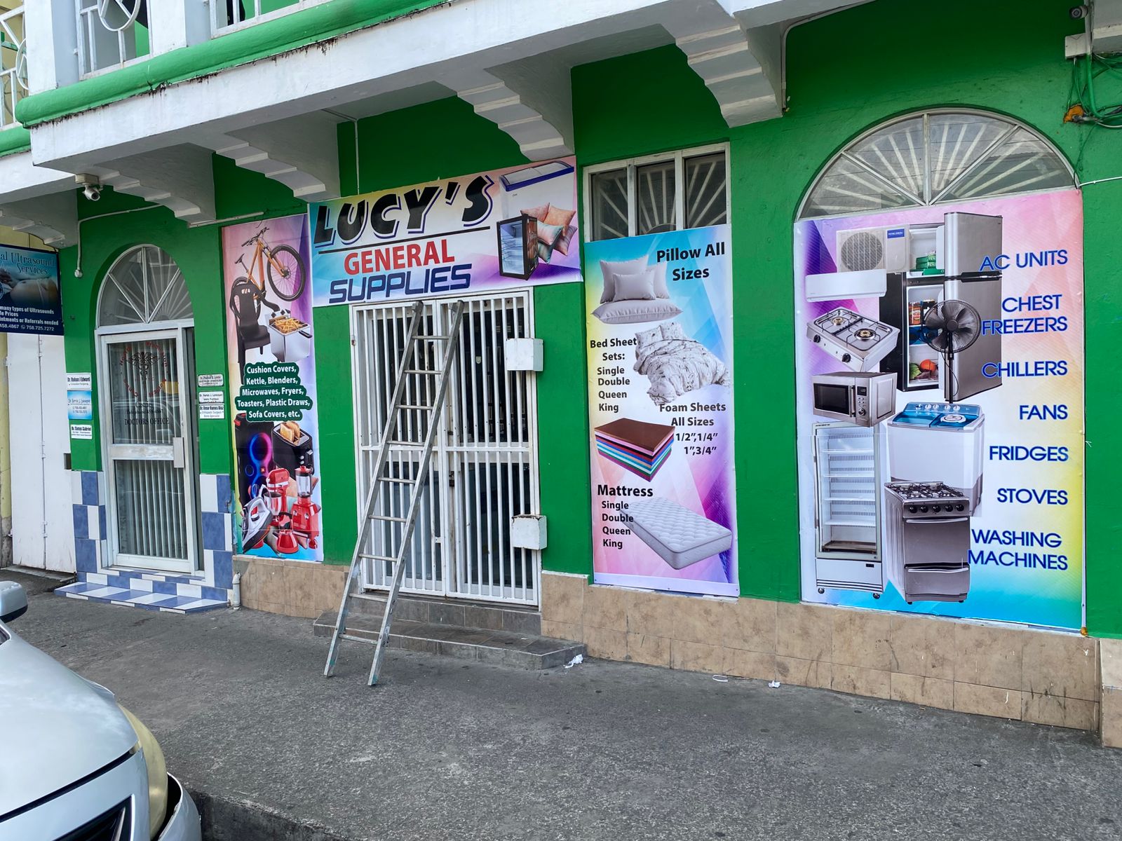 Colourful storefront graphics produced by Riot Media